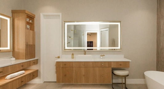 Dallas primary bathroom with Séura Allegro lighted mirrors and dual vanity