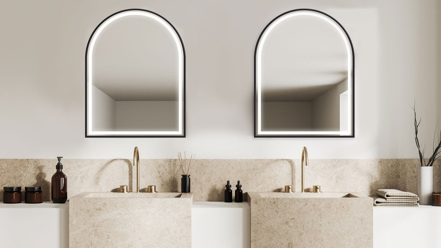 Two Seura Raphael Lighted Mirrors above a bathroom sink.